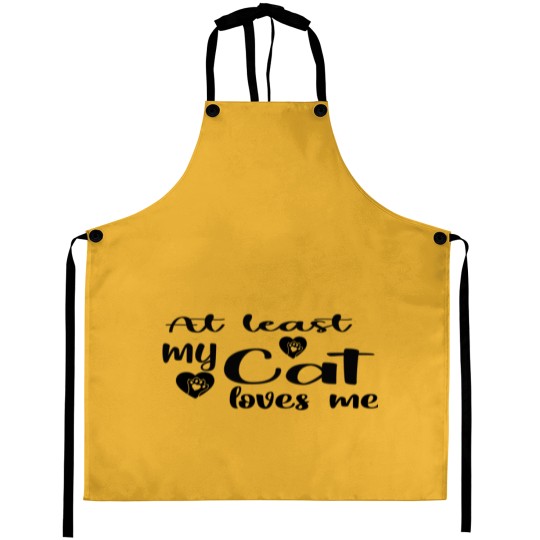 Discover AT LEAST MY CAT LOVES ME Aprons