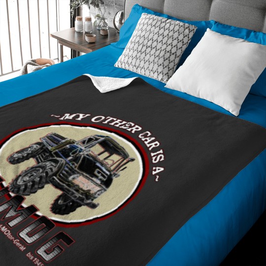 Discover My other car is a UNIMOG Baby Blankets