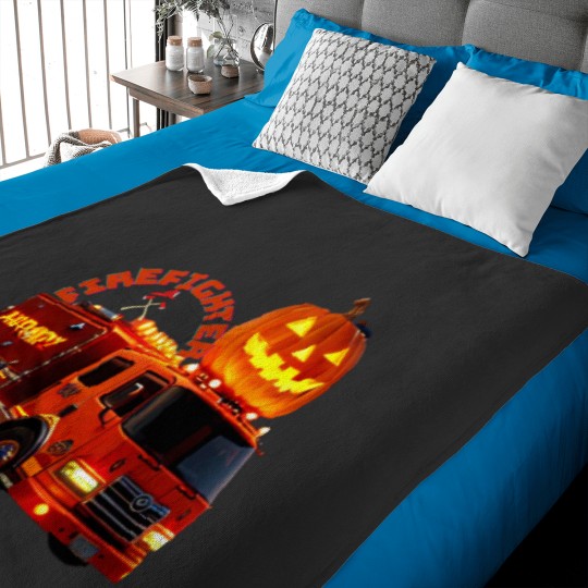 Discover Firefighter on halloween night Baby Blankets