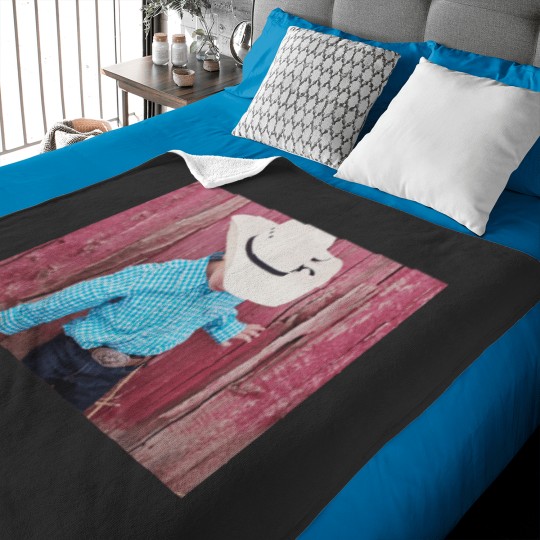 Discover cowboy hat and belt buckle Baby Blankets