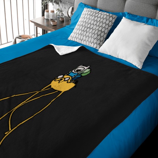 Discover Finn rides on Jake Adventure Time Baby Blankets