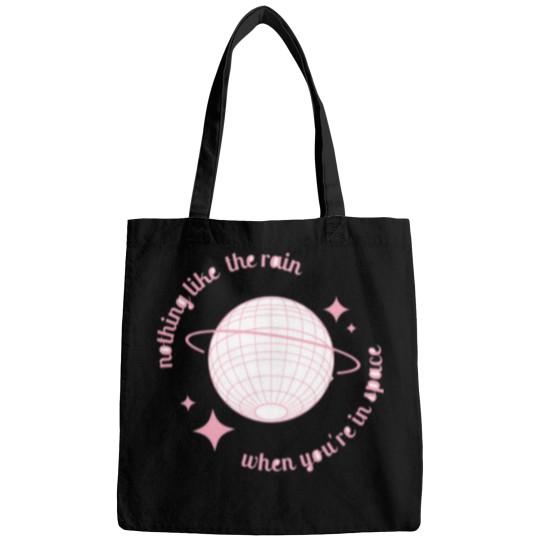 Discover nothing like the rain 5sos Active T-Shirt Bags