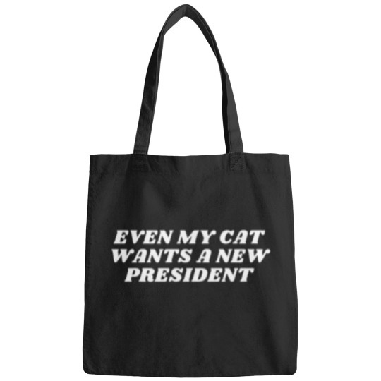 Discover Even My Cat Wants A New President T-Shirt Bags