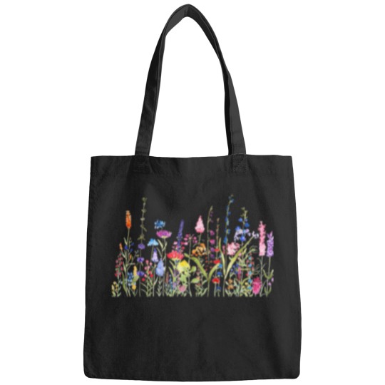 Discover colorful wild flower field Bags