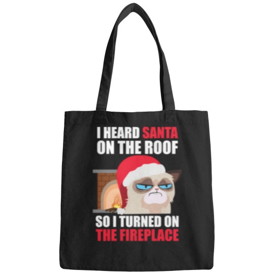 Discover Funny Christmas Cat Hates Santa Grumpy Annoyed Cats Bags
