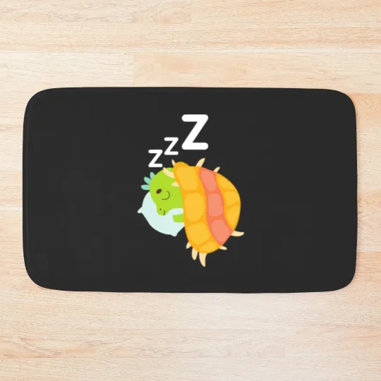 Discover Cute little dino sleeping Bath Mats