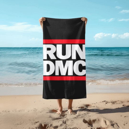 Discover run dmc  Beach Towels