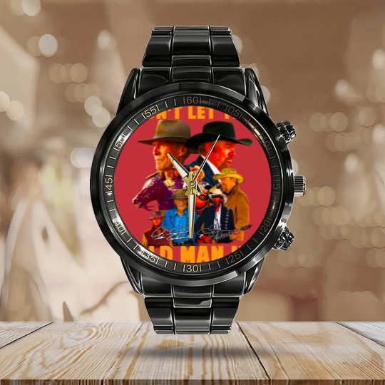 Discover Clint Eastwood and Toby Keith Calendar Steel Band Watch