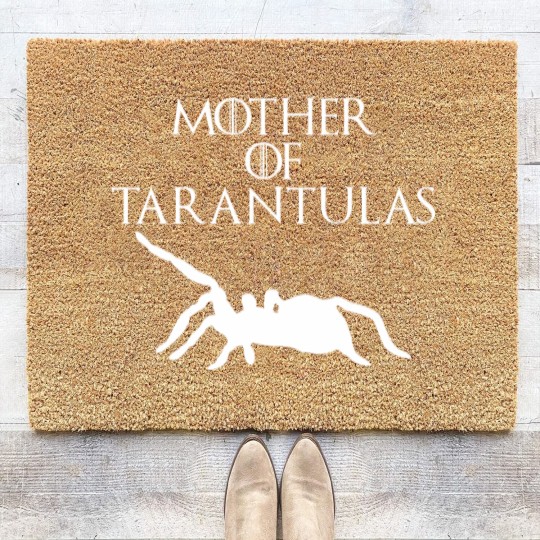 Discover Cute & Unique White Mother of Tarantulas Coir Doormats E010521