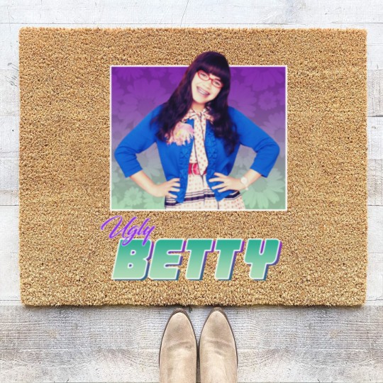Discover Ugly Betty - 80s Style Nostalgic Print by GrumpyWire Essential Coir Doormats
