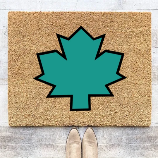 Discover Total Drama Island Owen Maple Leaf Emblem Classic Coir Doormats