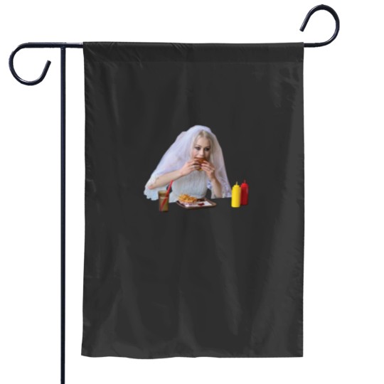 Discover Phoebe Bridgers Eating Garden Flags