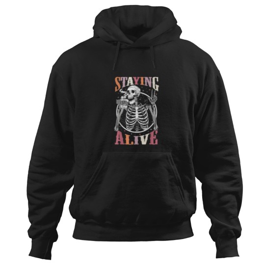 Discover Staying Alive Skeleton Drinking Coffee Lover Gif Hoodies