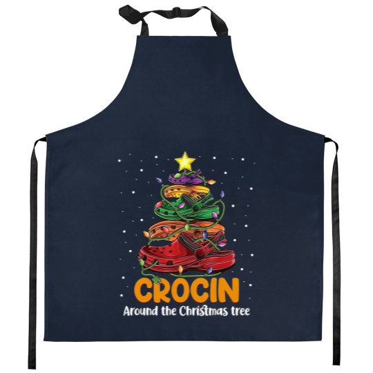 Discover Crocin around the christmas tree Classic Kitchen Aprons