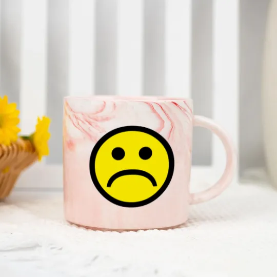 Discover Sad Face Marble Mugs