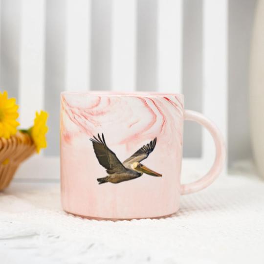 Discover Brown Pelican In Flight Marble Mugs