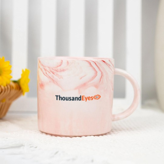 Discover thousand eyes free Marble Mugs