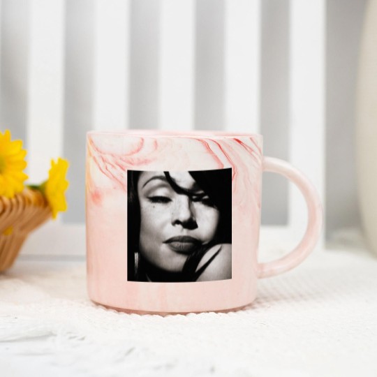 Discover Sade Adu Marble Mugs