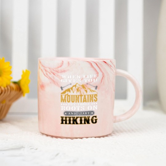 Discover When life gives you mountains put those boots on Marble Mugs