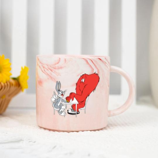 Discover BUGS BUNNY™ and Gossamer 2 Marble Mugs