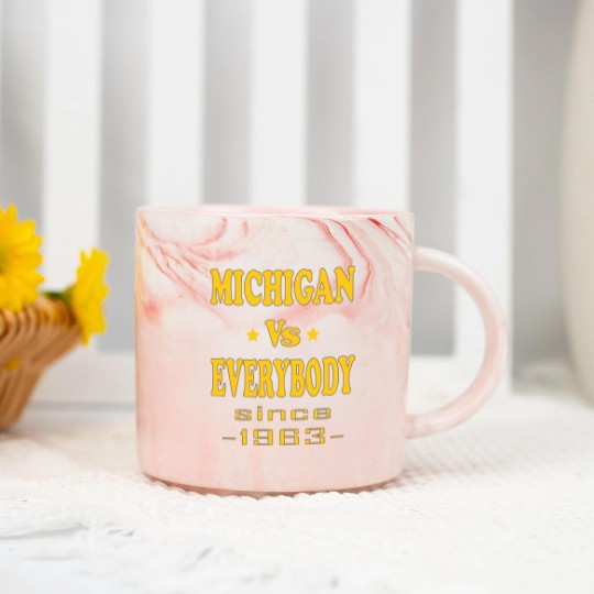 Discover michigan vs everybody Marble Mugs