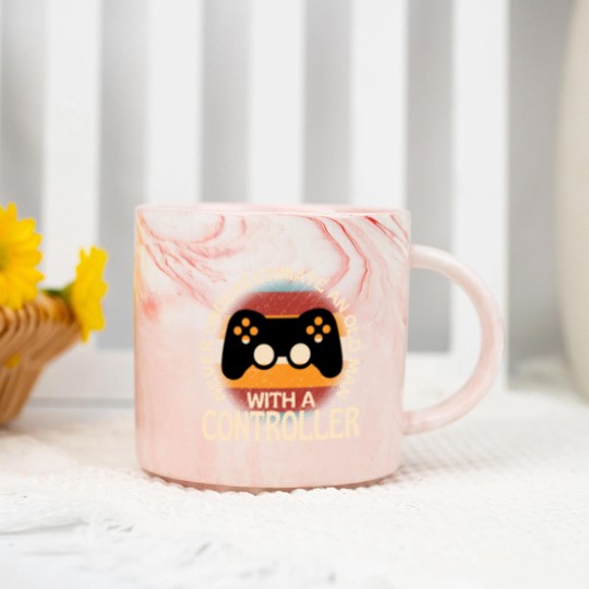 Discover Old Man With A Controller Marble Mugs