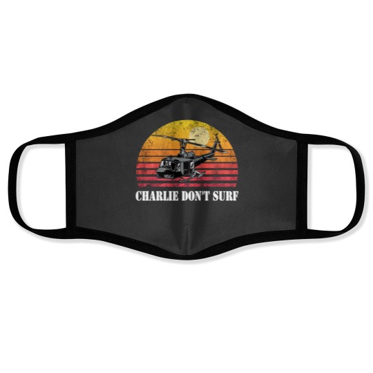 Discover Charlie Don't Surf Funny Face Masks