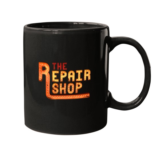 Discover the repair shop logo Mugs