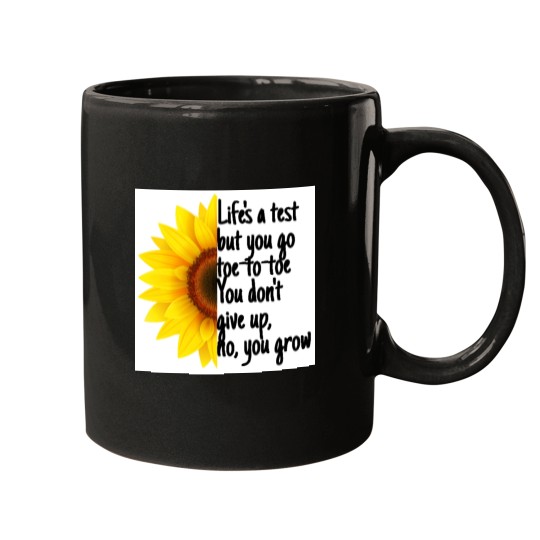 Discover Lifes a test Mugs