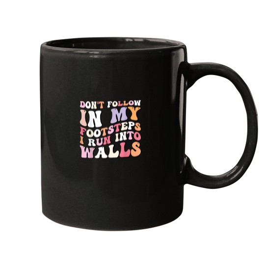 Discover Cool Funny tee Dont Follow In My Footsteps I Run Into Wall Mugs