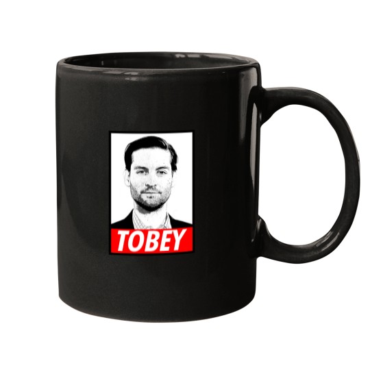 Discover T Maguire () Mugs
