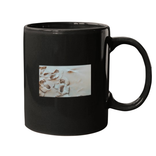 Discover Foot Prints In The Sand Mugs
