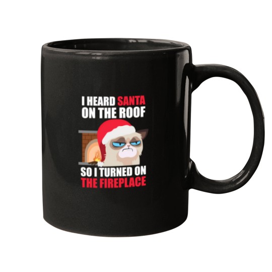 Discover Funny Christmas Cat Hates Santa Grumpy Annoyed Cats Mugs