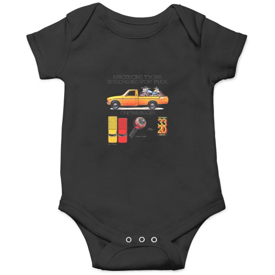 Discover Vintage Toyota Trucks ad graphic Onesies