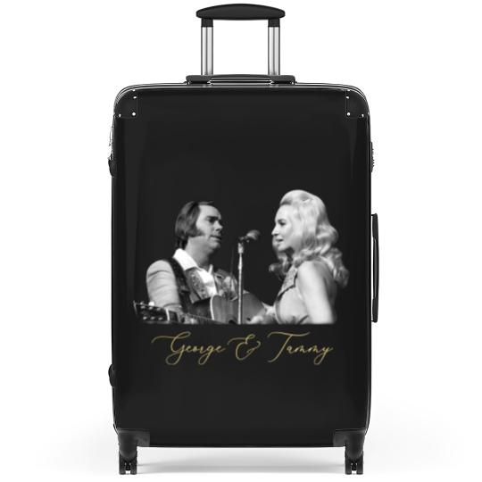 Discover George and Tammy Suitcases