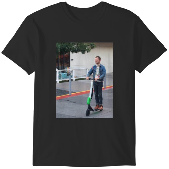 Discover elijah wood on a scooter Sticker T-Shirts