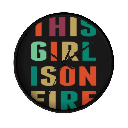Discover This Girl Is Girl On Fire Wall Clocks