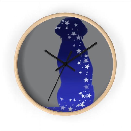 Discover Cosmic dog silhouette in blue with stars Wall Clocks